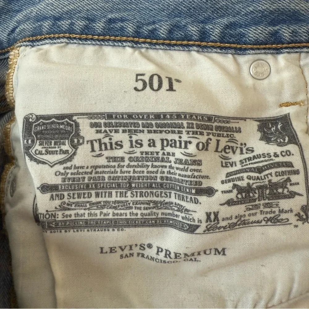 LEVI’s Premium 501 Distressed Light Wash Rigid Denim Jeans